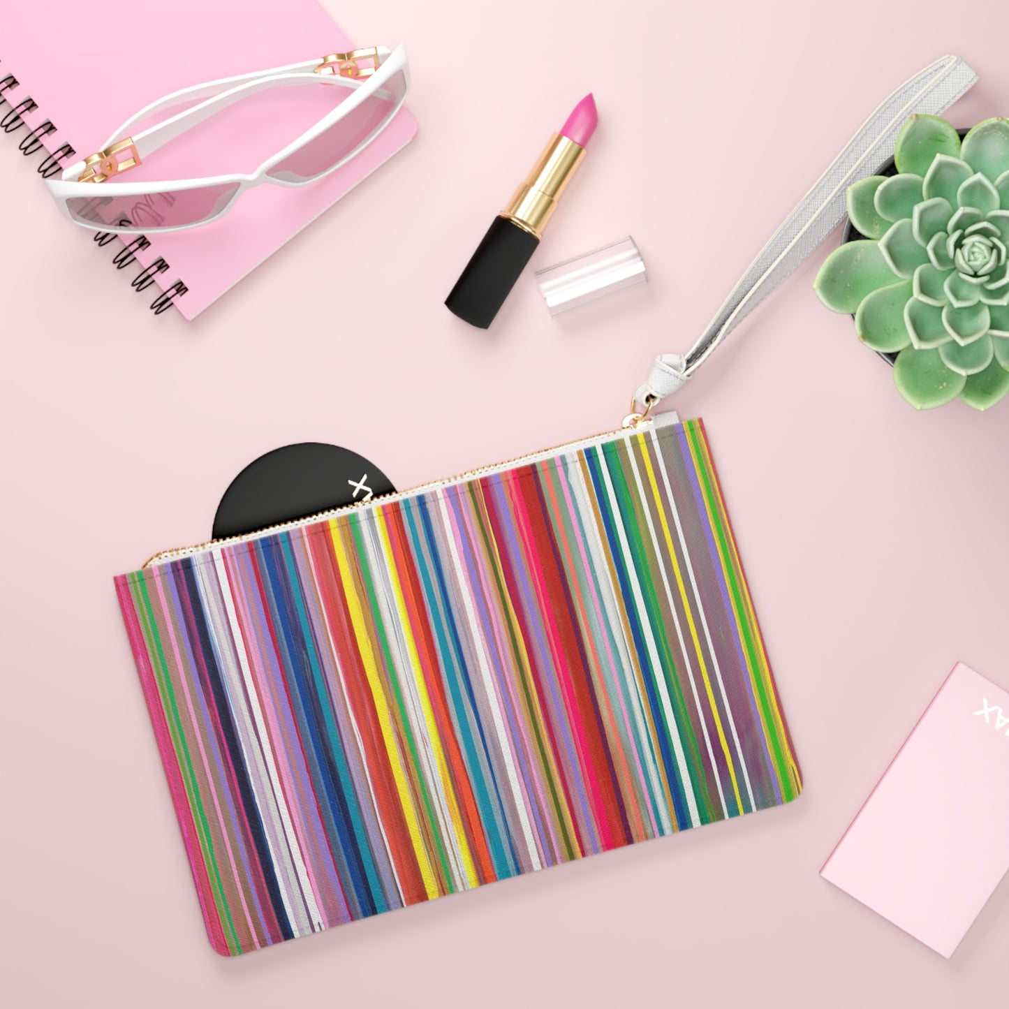 
                  
                    CANDY STRIPE CLUTCH
                  
                